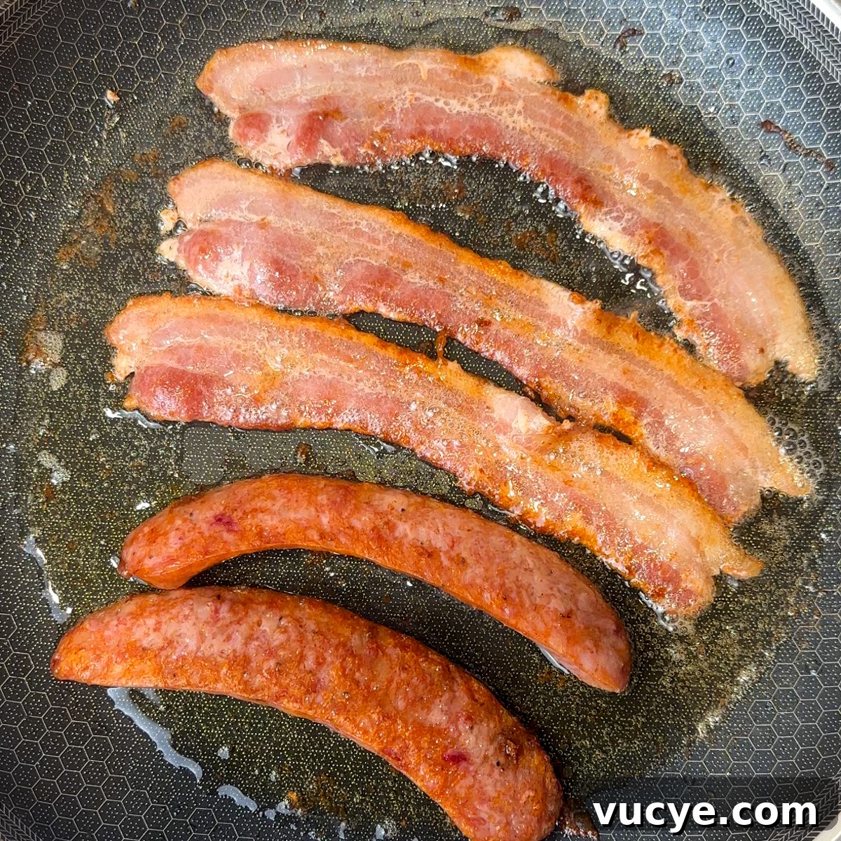 Fry the Canadian bacon & sausage