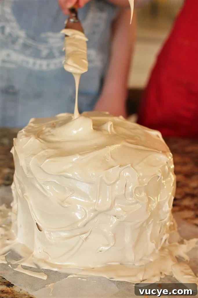 Seven-Minute Frosting Recipe Kids Can Make for Birthday Cakes 15 spreading the seven minute frosting