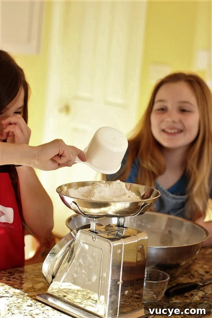 Seven-Minute Frosting Recipe Kids Can Make for Birthday Cakes 4 measuring for the cake with seven minute frosting