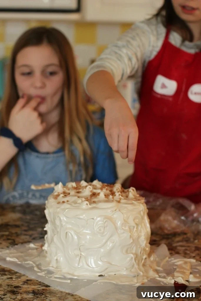 Seven-Minute Frosting Recipe Kids Can Make for Birthday Cakes 9 sprinkling toffee bits on the seven minute frosting