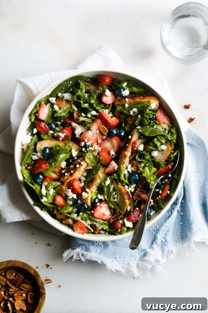 Strawberry Chicken Salad with Bacon and Poppy Seed Dressing 2 Strawberry summer salad in a bowl.