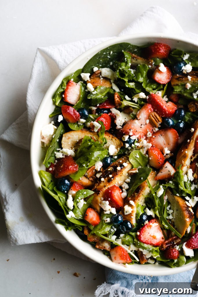Strawberry Chicken Salad with Bacon and Poppy Seed Dressing 7 Strawberry summer salad in a bowl.