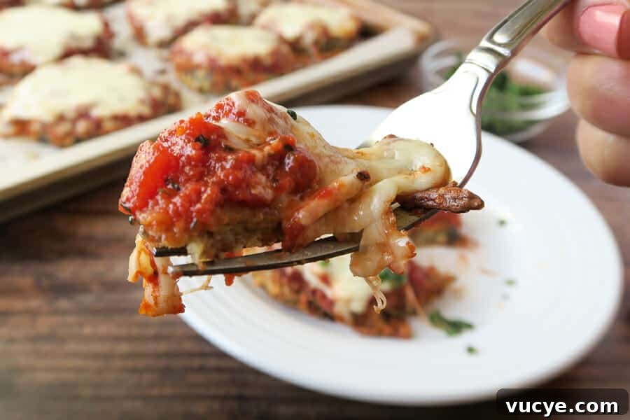 Crispy Baked Eggplant Parmesan (No-Fry, Simple Recipe) 18 bite shot of the eggplant parmesan