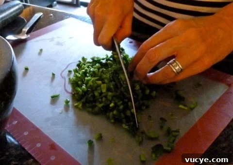 Chopping chiles for salsa.