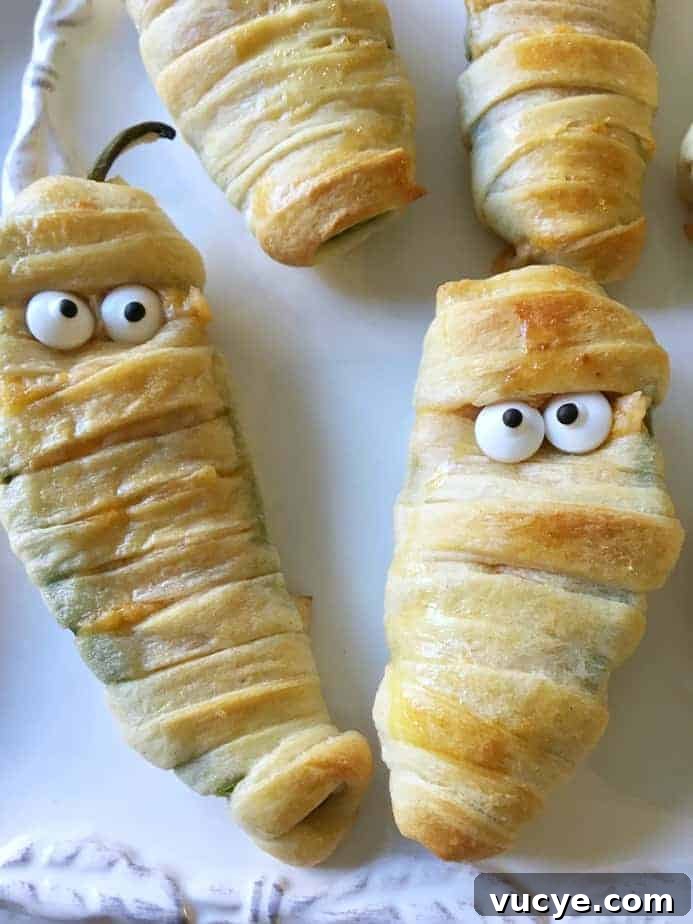 2 mummy jalapeno poppers