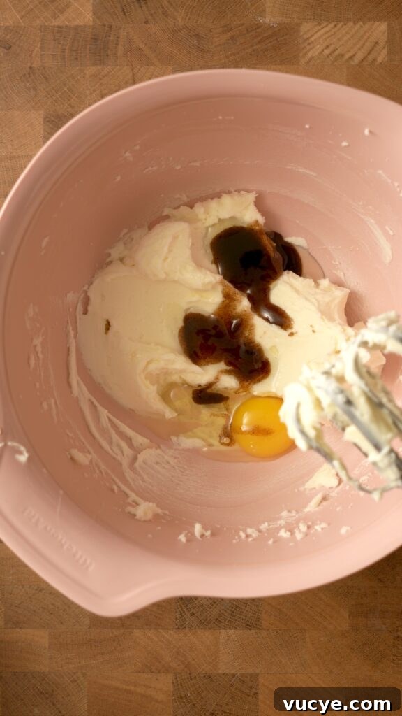 Adding egg and vanilla