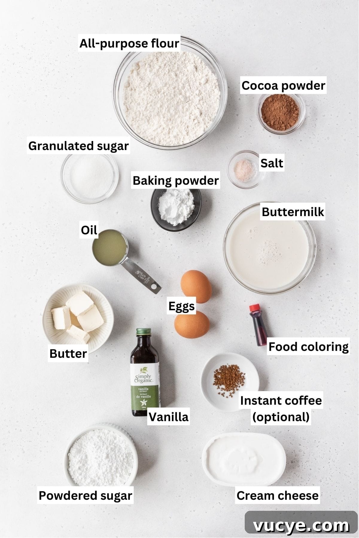 Red Velvet Waffles Recipe: fluffy, rich, and irresistible 3 All of the ingredients for the red velvet waffles on a white counter.