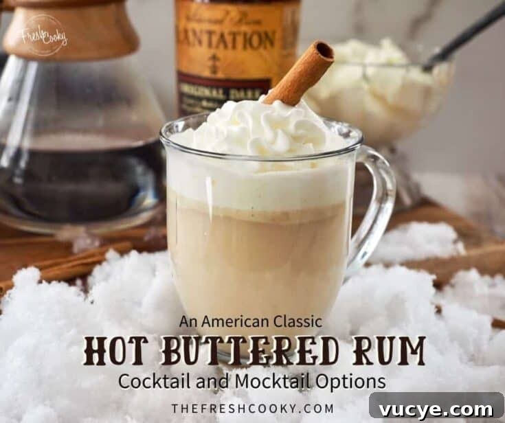 Hot buttered rum topped with whipped cream and a cinnamon stick.