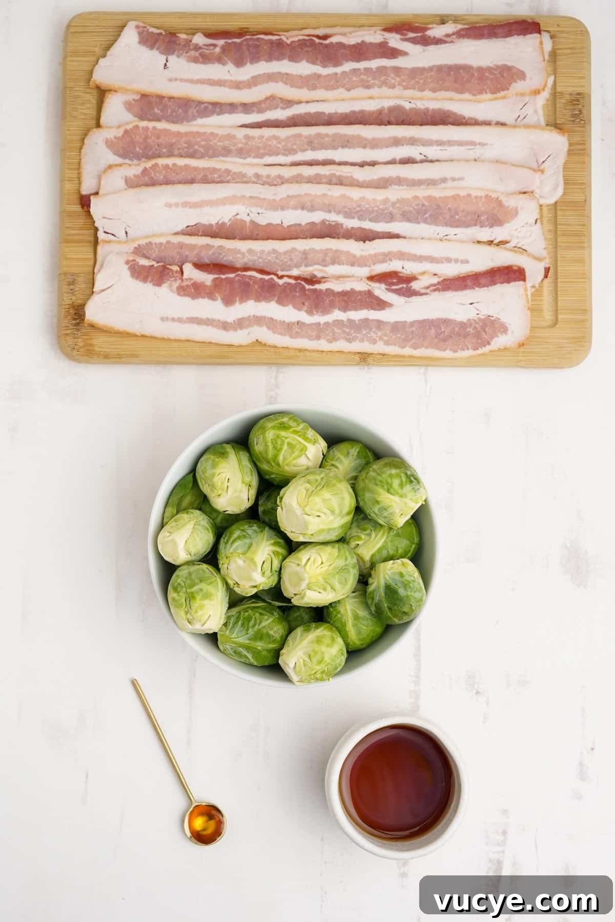 Ingredients to make bacon wrapped brussels sprouts on the table.