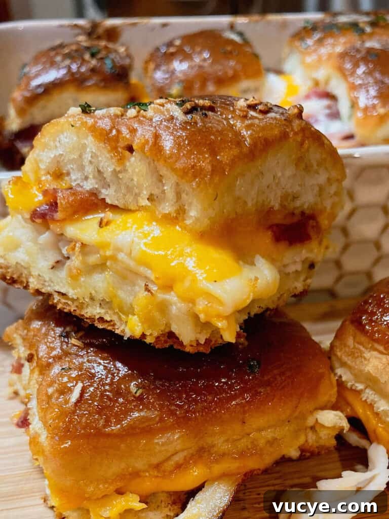 Chicken Bacon Ranch Sliders Recipe: Savory Mini Sandwiches 2 Stacked sliders with melty cheese, warm chicken and ranch dressing.