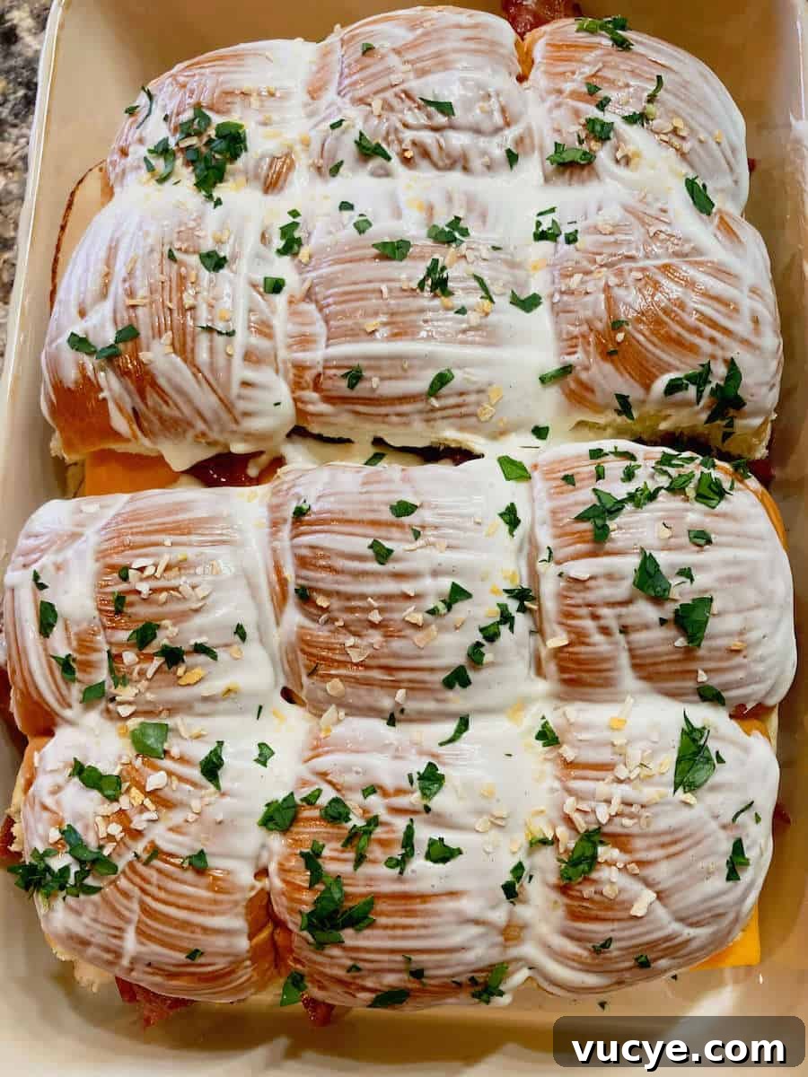 Chicken Bacon Ranch Sliders Recipe: Savory Mini Sandwiches 6 Chicken bacon ranch sliders brushed with butter, garlic and parsley.