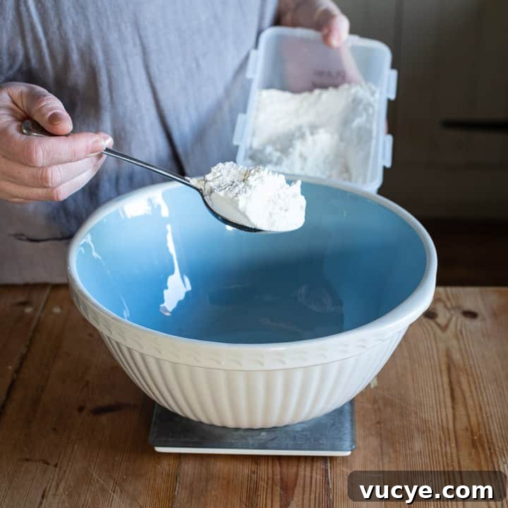 mixing flour into bowl