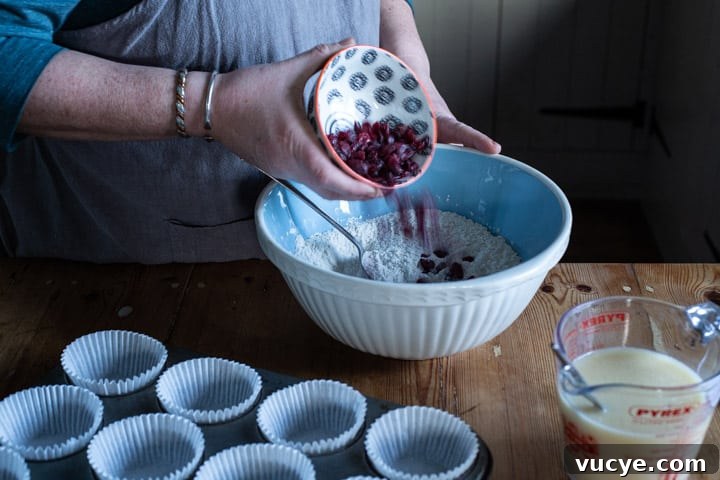 adding cranberries to batter