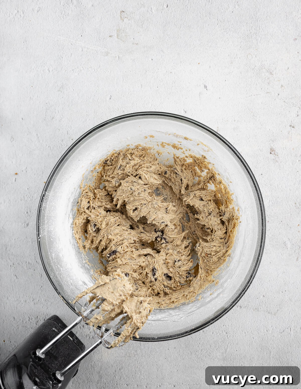 Oreo Chocolate Chip Cookies Recipe — Crispy Edges, Chewy Center 12 a bowl of cookie dough with cookie crumbs in it.