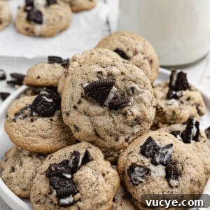 Oreo Chocolate Chip Cookies Recipe — Crispy Edges, Chewy Center 18 a plate of Oreo chocolate chip cookies on a plate.