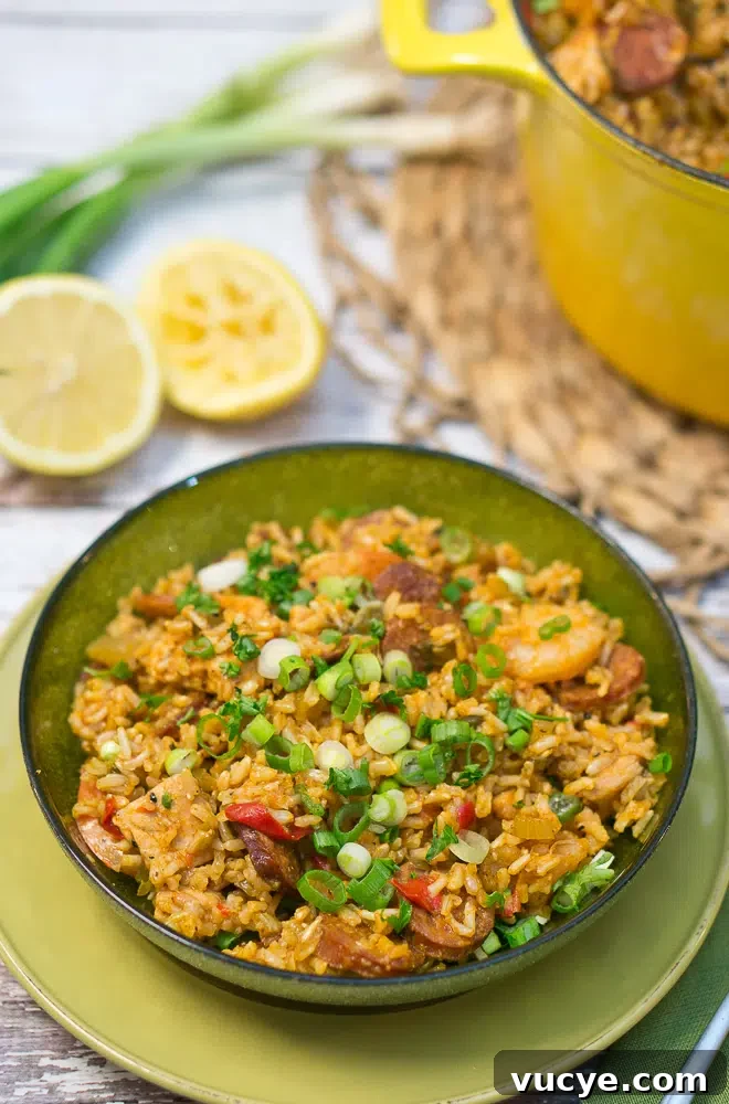 jambalaya served in a bow with fresh herbs