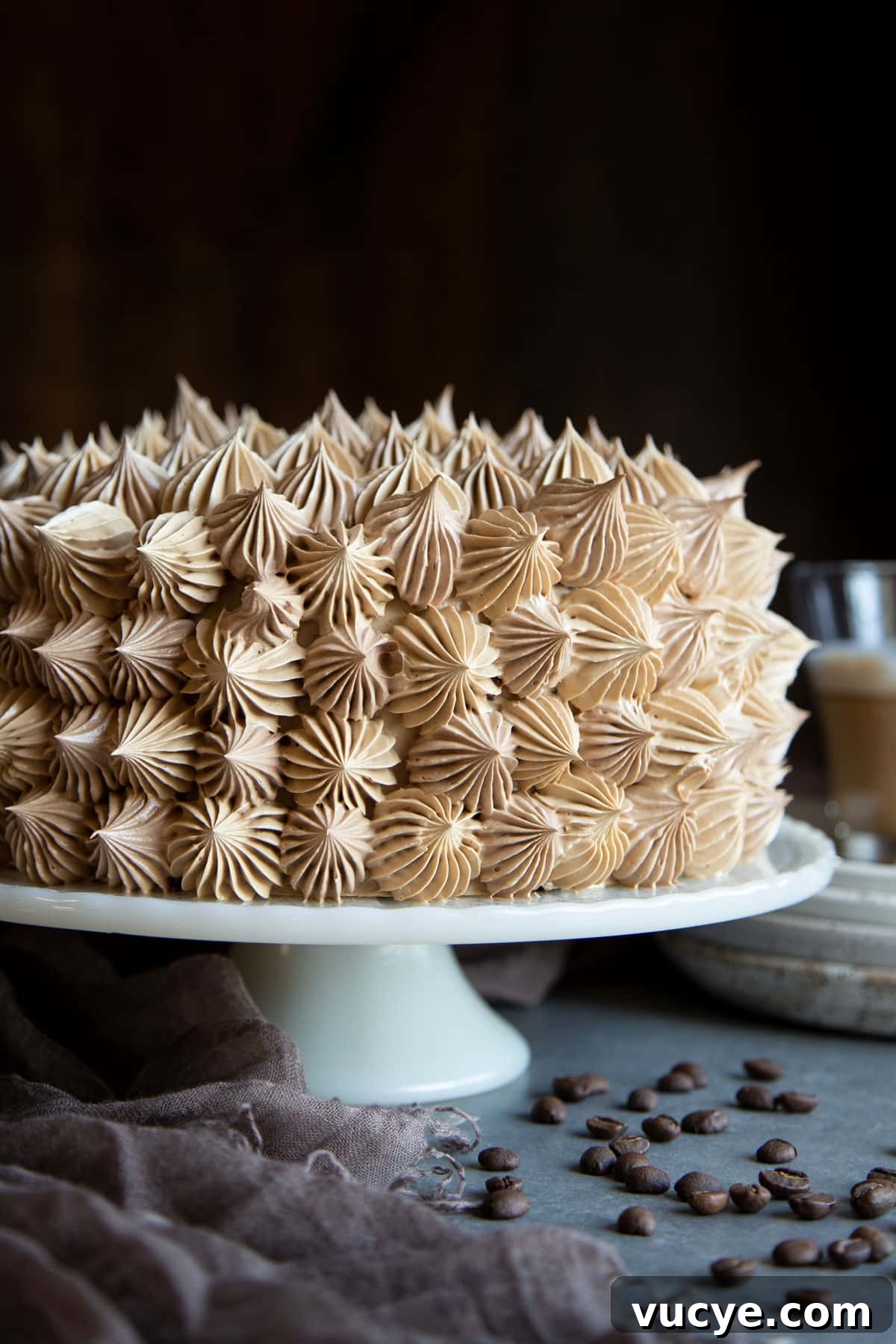 Coffee buttercream on a cake.