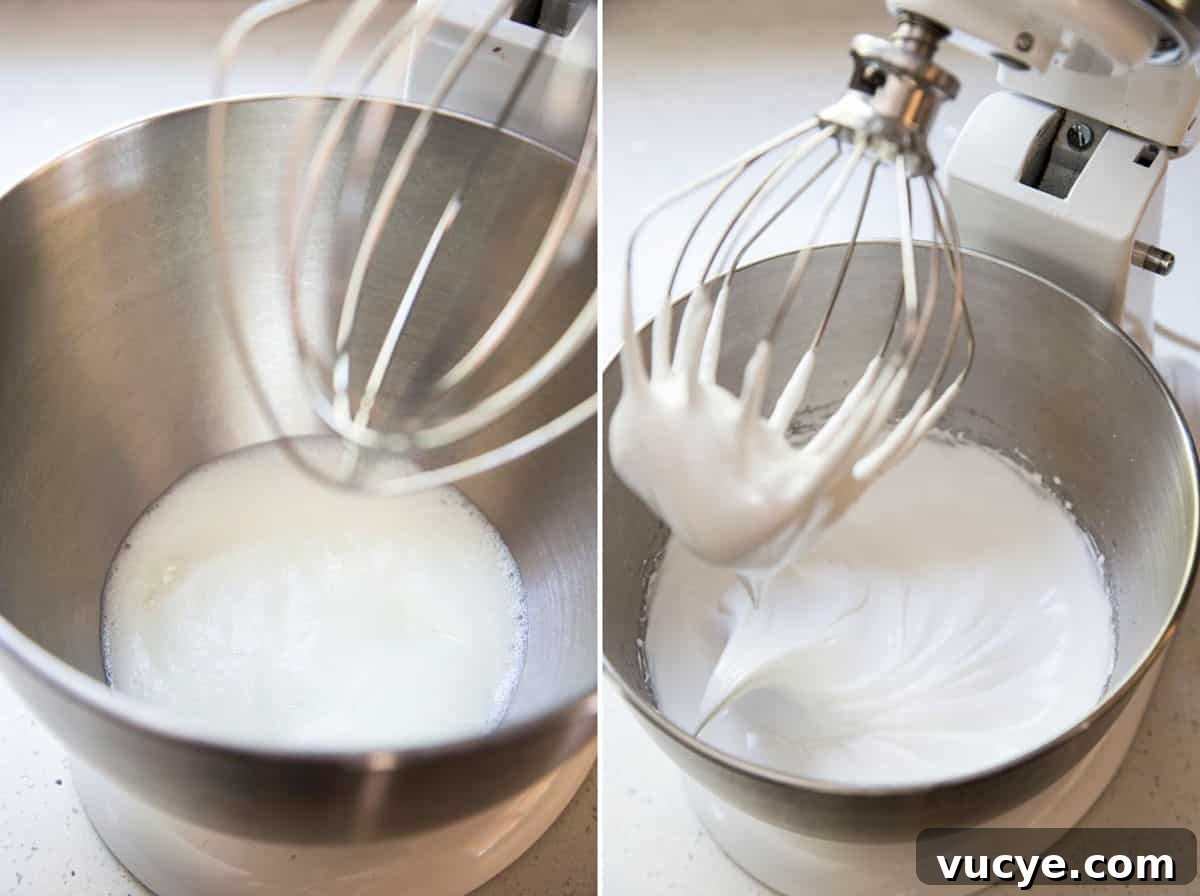 Beat warm egg white mixture into a stiff meringue in a stand mixer bowl.