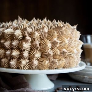 Coffee buttercream on a cake.