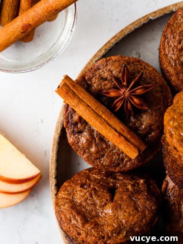 close up photo of an apple muffin with cinnamon