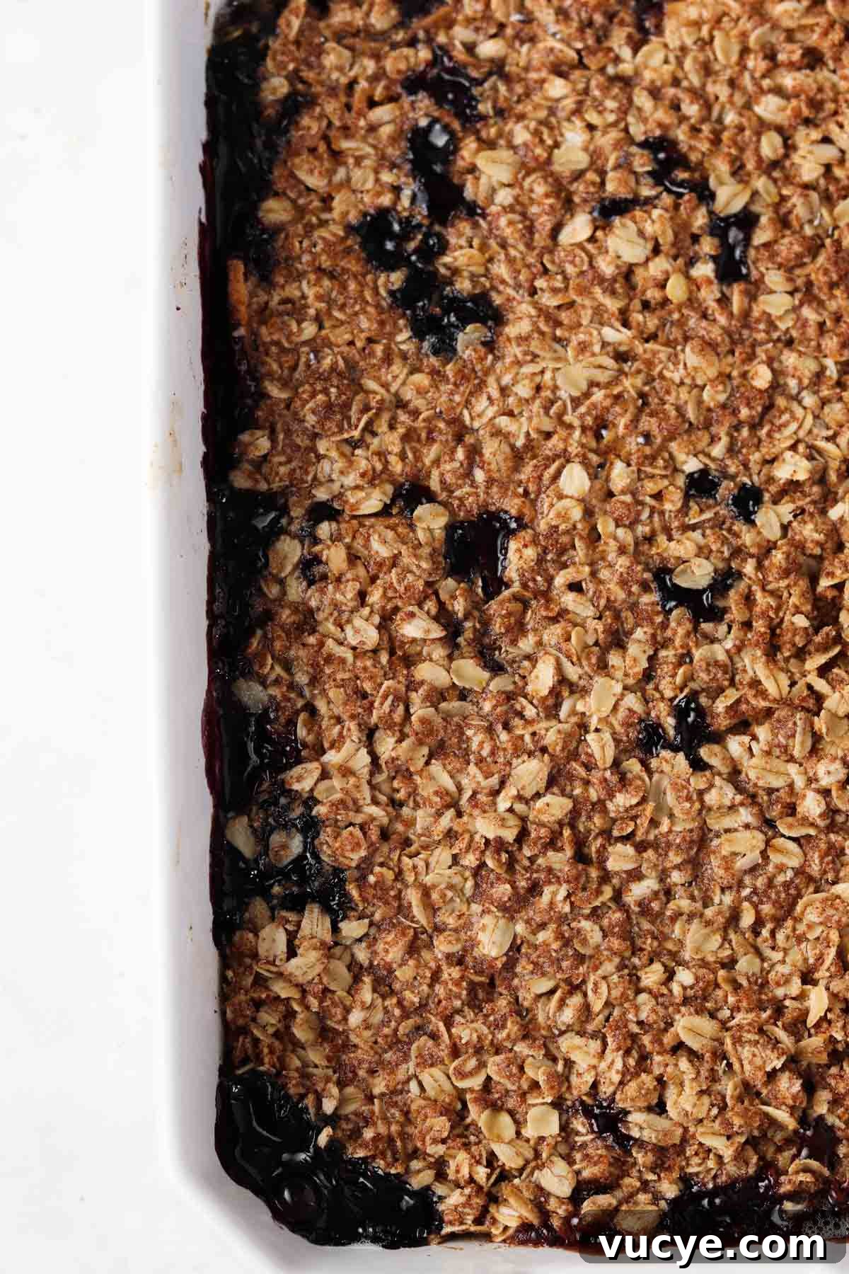 Apple and Blueberry Crumble Recipe: Light, Fruity Dessert Guide 9 Baked blueberry and apple crumble in a casserole dish.