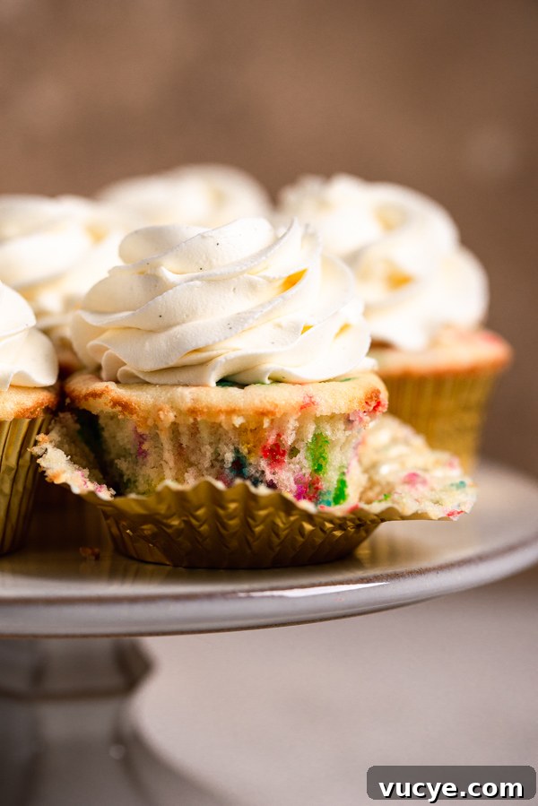 Funfetti Cupcakes with Vanilla Bean Buttercream Frosting 5 Baked cupcakes cooling