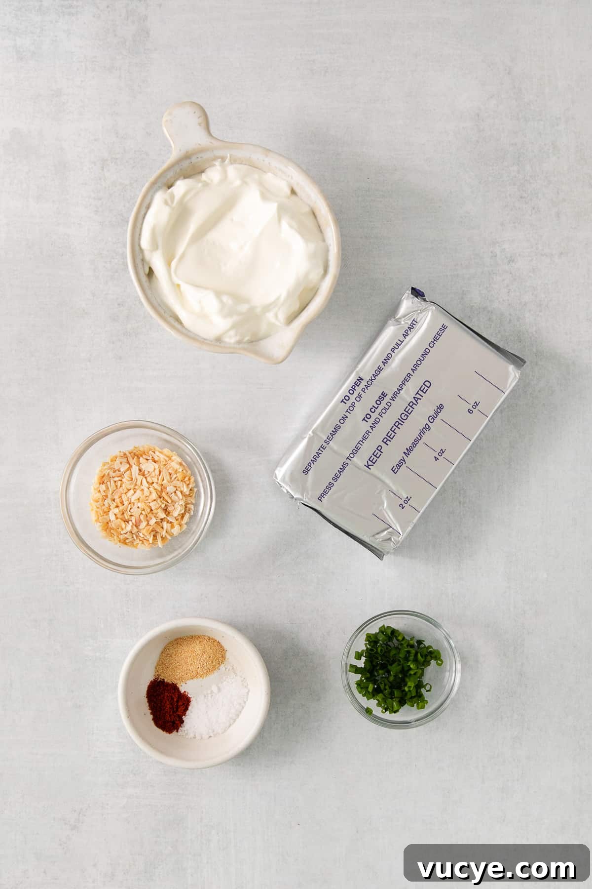 Ingredients for chip dip in bowls.