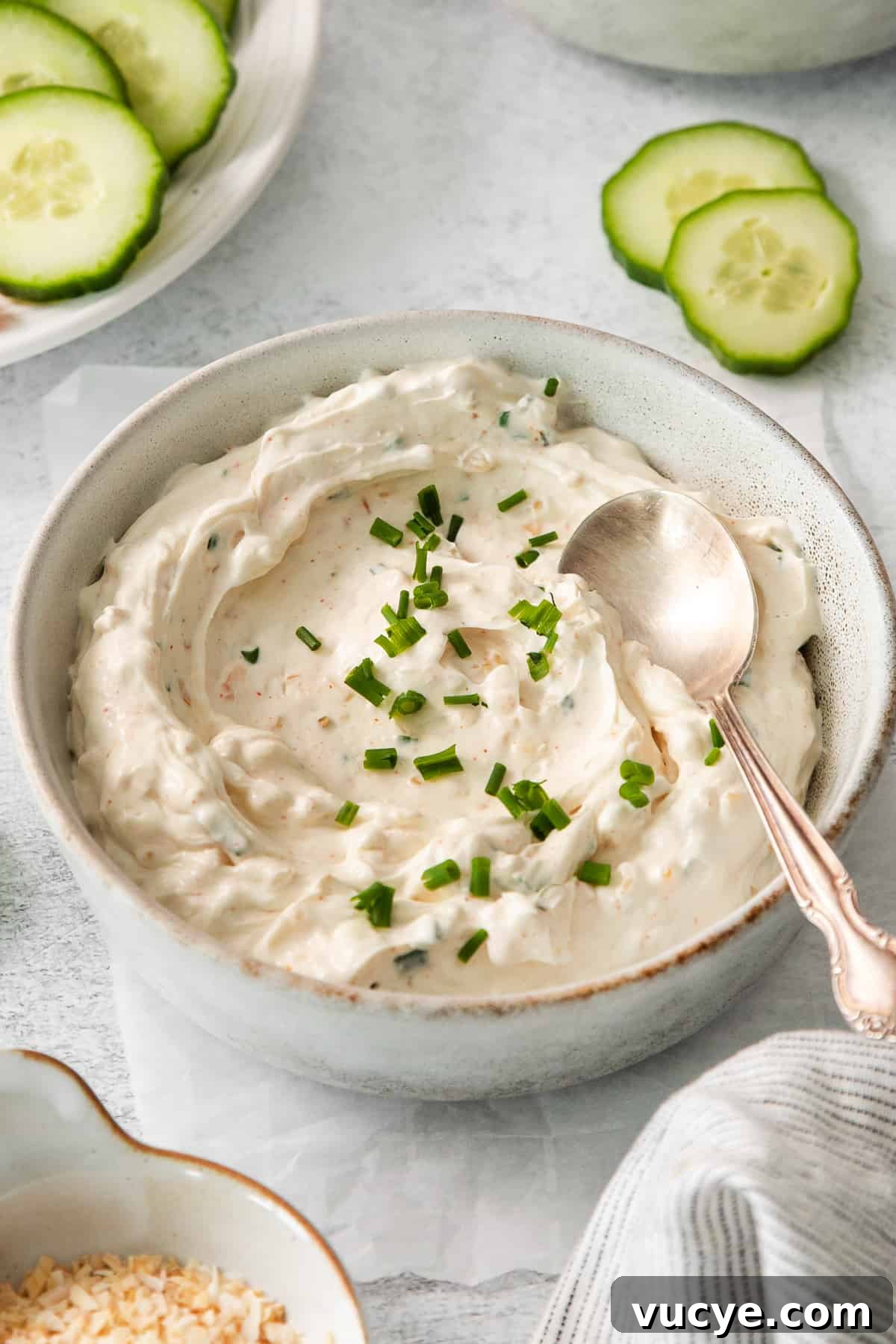 Chip dip in a bowl with a spoon.