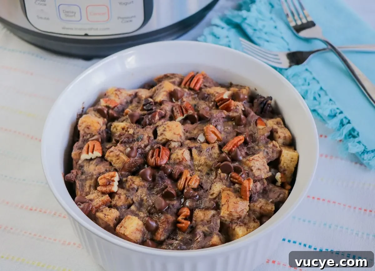 Creamy Instant Pot Bread Pudding Recipe for Any Occasion 8 A ramekin of chocolate gluten free bread pudding.