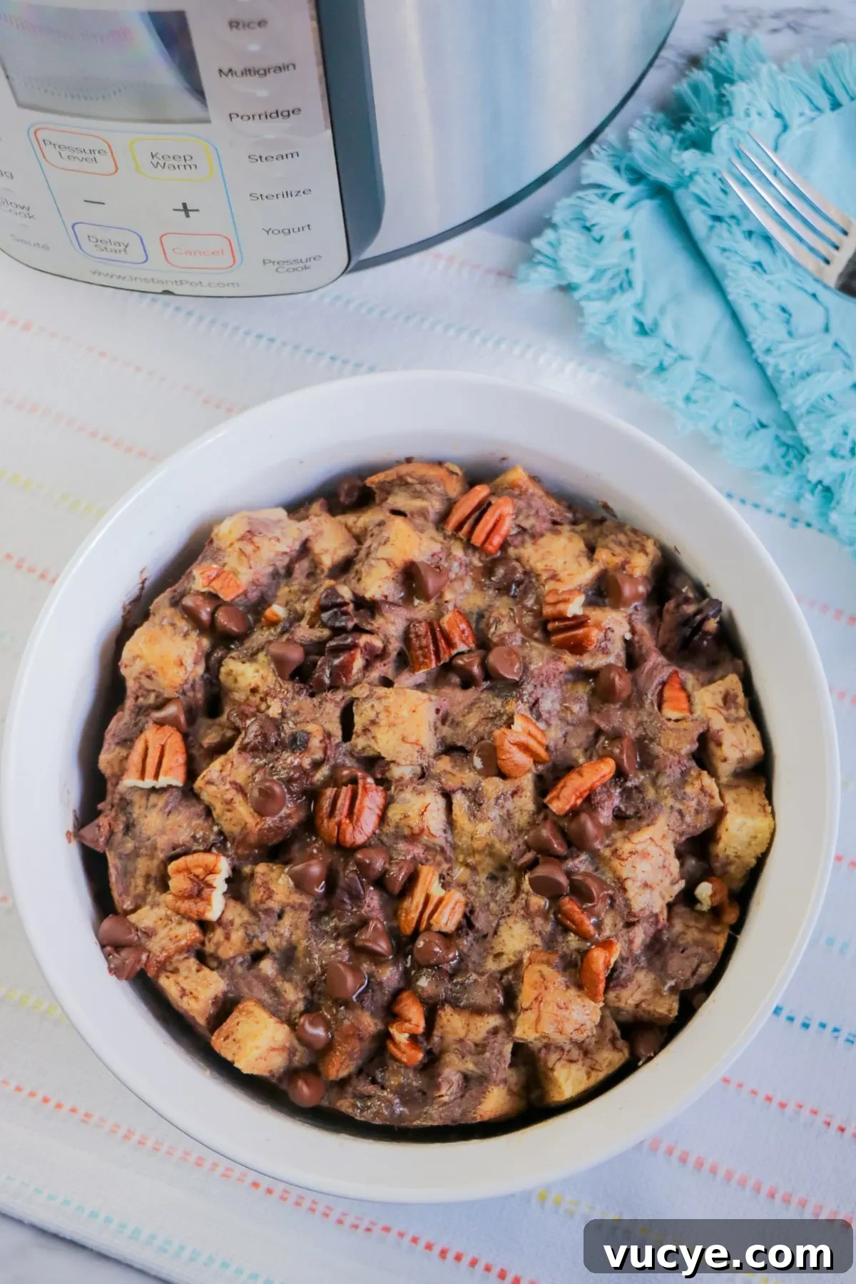 Creamy Instant Pot Bread Pudding Recipe for Any Occasion 3 Looking down on a bowl of homemade gluten free bread pudding.