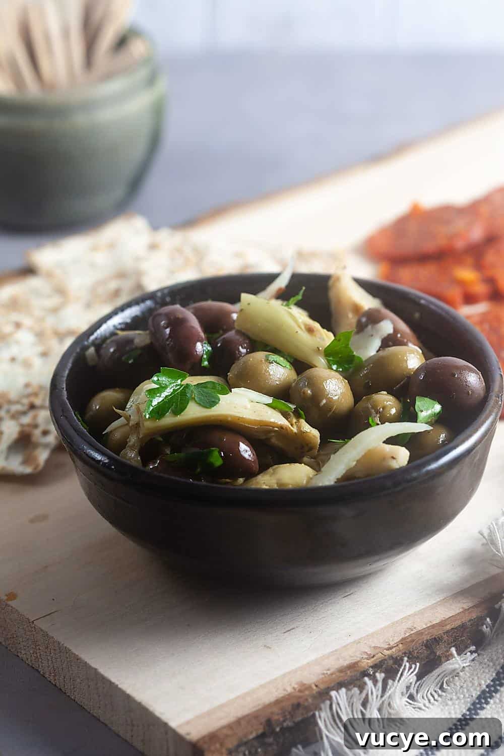 Marinated Artichoke and Olive Appetizer Recipe in a dark bowl