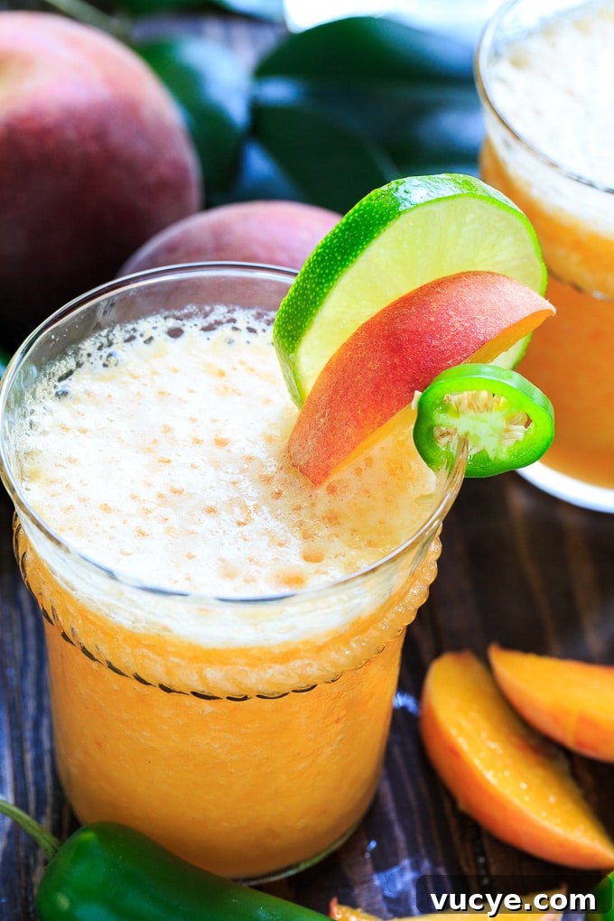 Peach Jalapeño Margarita Recipe: Refreshing Spicy Summer Cocktail 4 Peach Jalapeno Margarita flavored with jalapeno simple syrup
