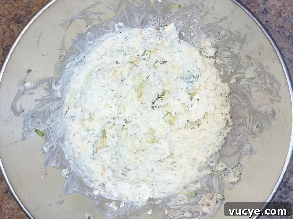 Cucumber Tea Sandwich Recipe for Light, Refreshing Tea Parties 4 Cream cheese mixture in a mixing bowl.