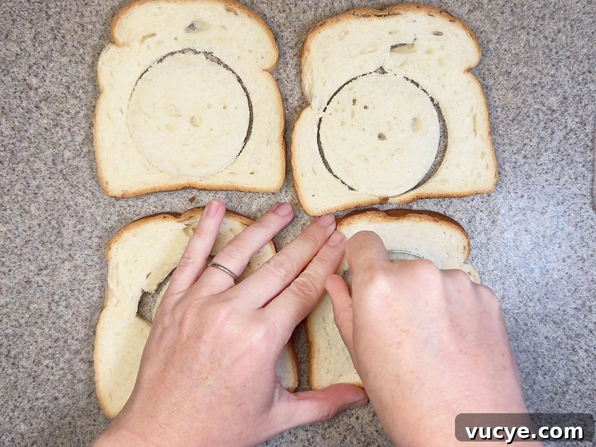 Cucumber Tea Sandwich Recipe for Light, Refreshing Tea Parties 5 Using a biscuit cutter to cut the white bread into circles.