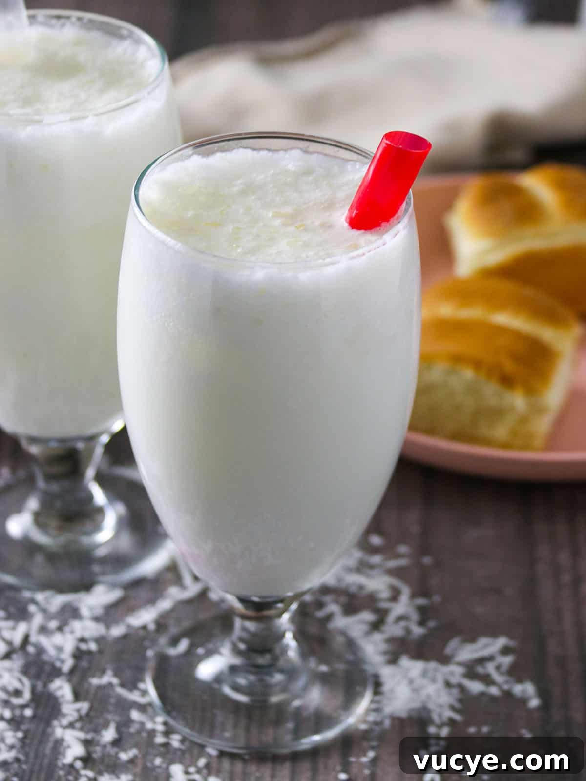 Creamy Filipino Buko Shake Recipe — Refreshing Coconut Milkshake 2 Buko Shake in a glass