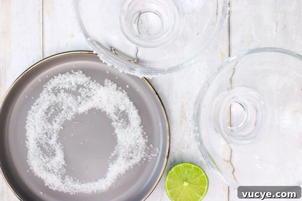 rub a lime around the glass rim then dip in salt