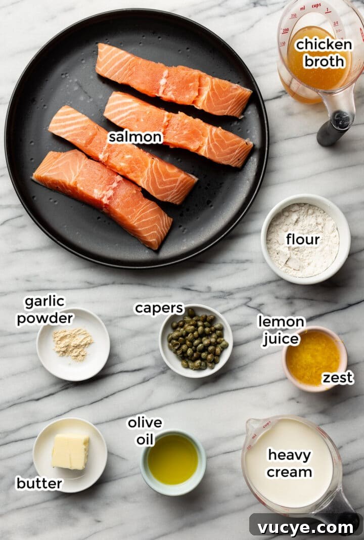 Creamy Lemon Salmon Piccata Recipe for Weeknight Dinners 3 ingredients for salmon piccata on a marble surface