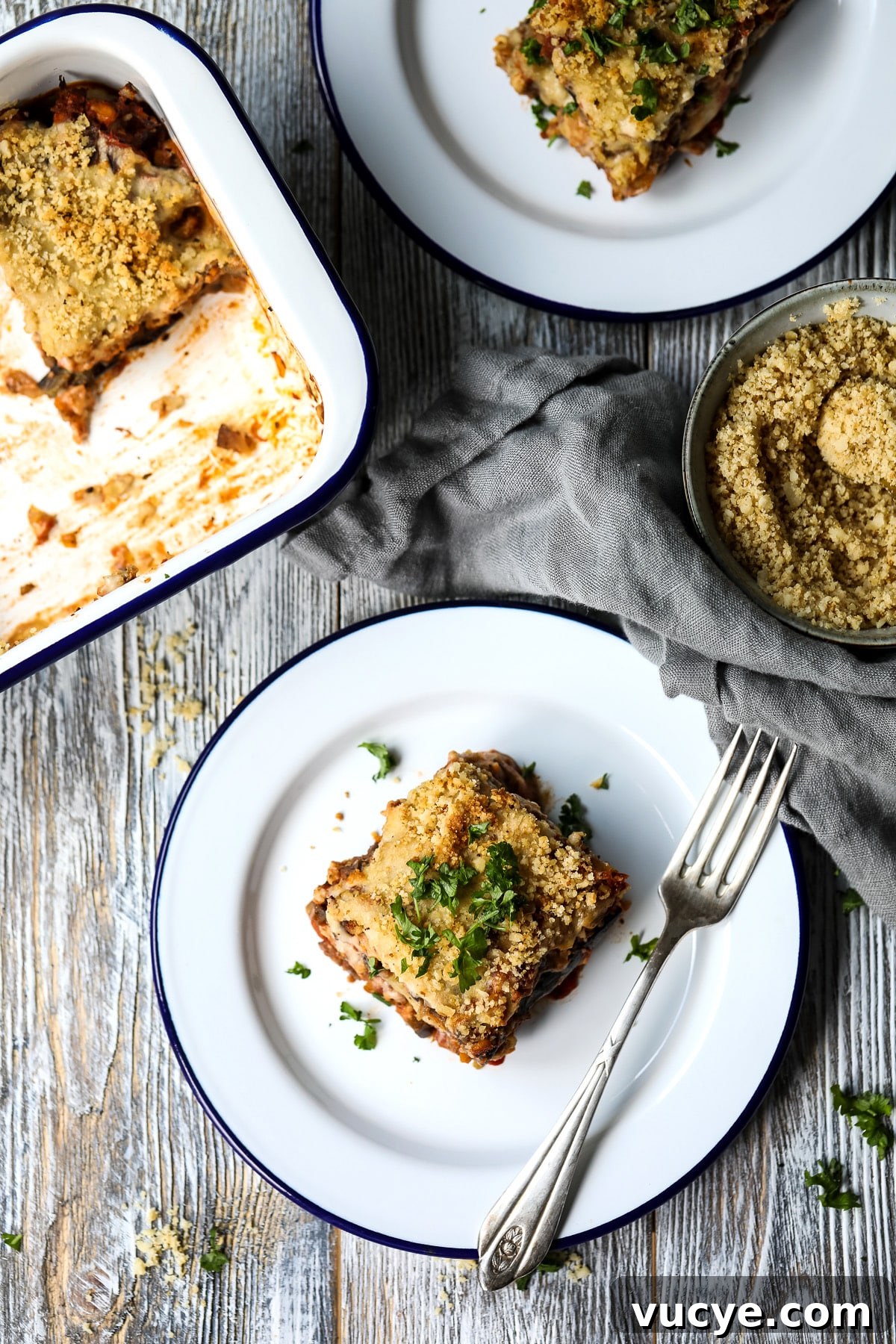 A Serving of Vegan Eggplant Lasagna Garnished with Parsley.