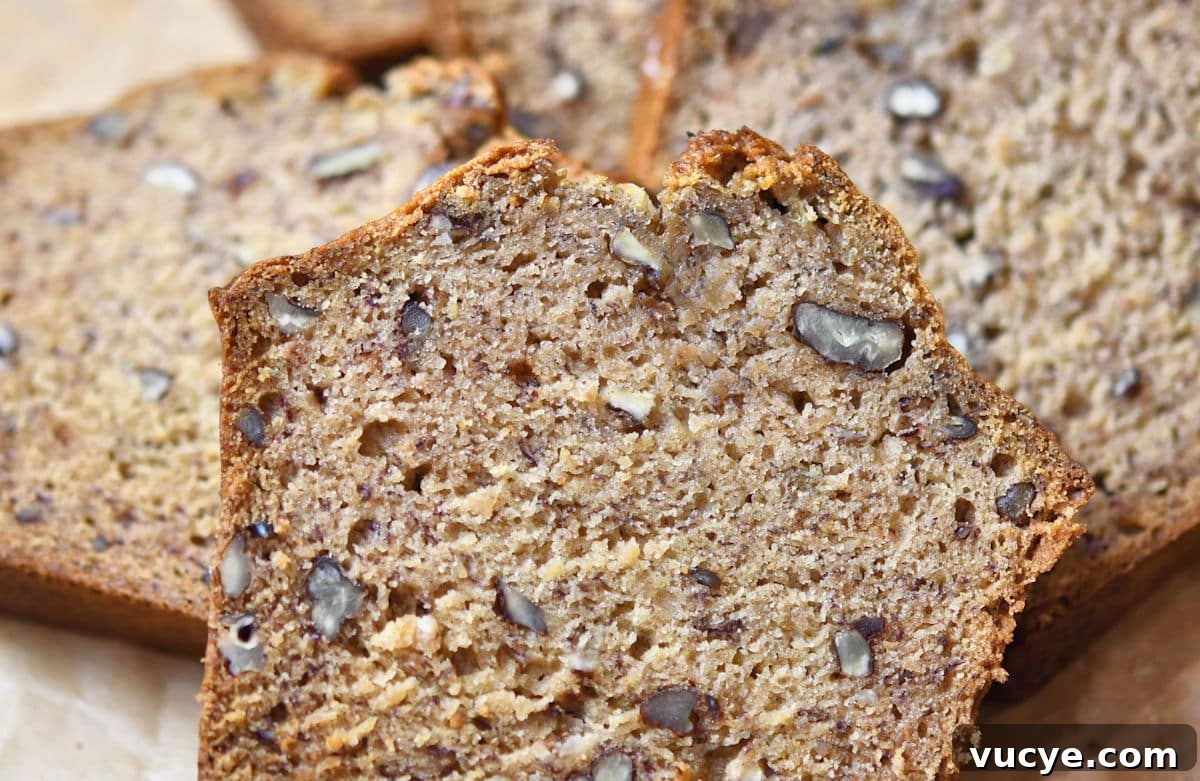 closeup of pecan banana bread with applesauce