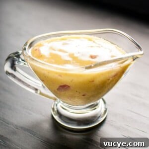 A whisk, garlic, rice vinegar, dijon mustard, shallots, and olive oil create a wonderful emulsion that will make your salad greens taste fantastic.