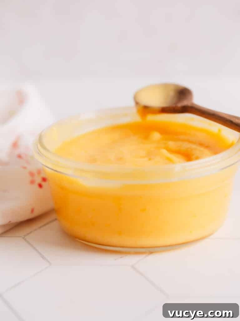 Homemade lemon curd filling for lemon curd cookies.