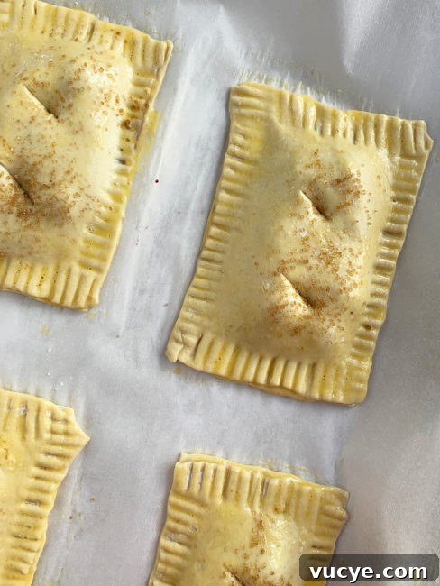 Mini Cherry Hand Pies: Bite-Sized Fruit Pastries Recipe 7 Puff pastry mini cherry pies ready to bake.
