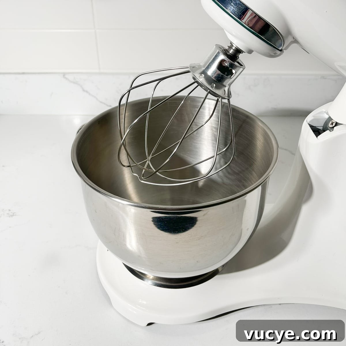 Lemon Meringue Pie with a Buttery Biscuit Crust Recipe 7 A stand mixer fitted with the whisk attachment.
