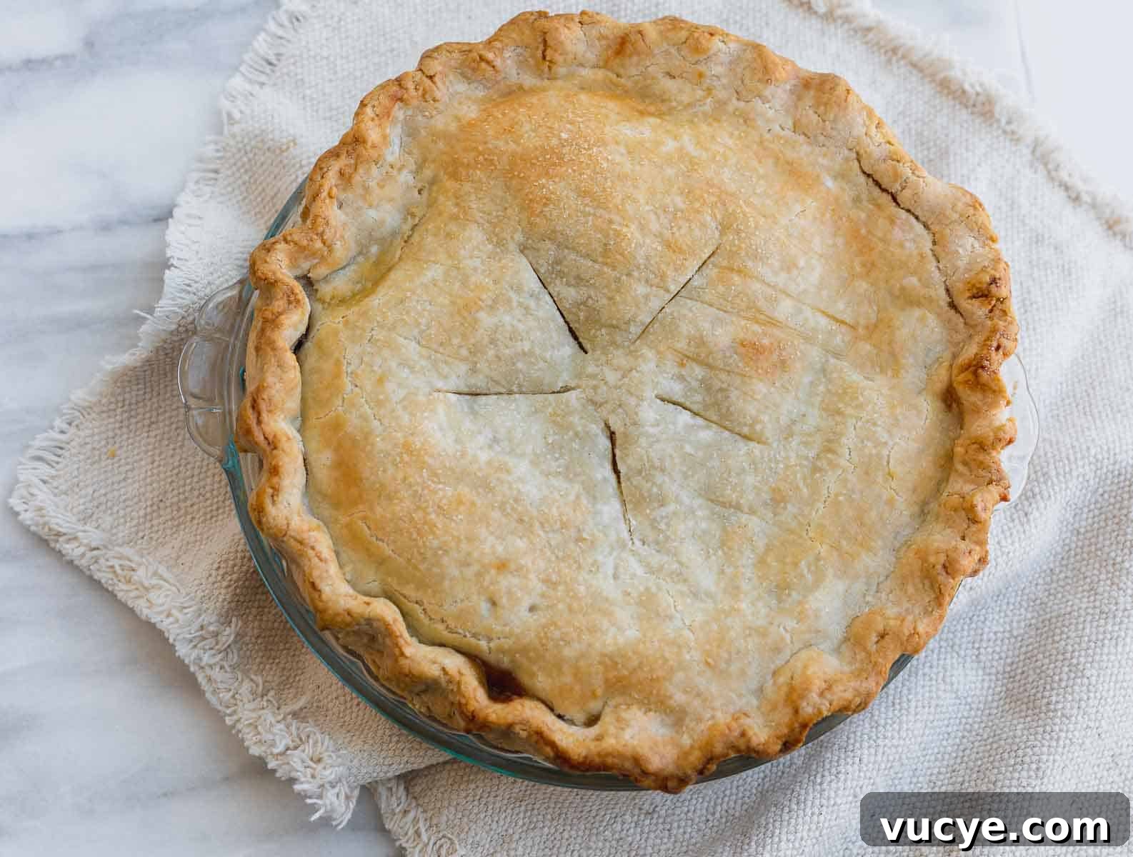 Classic Gluten-Free Apple Pie Recipe for Perfect Autumn Baking 7 apple pie cooling on brown dish towel
