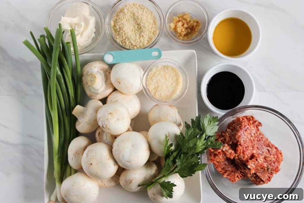 Italian-Style Stuffed Mushrooms with Garlic & Parmesan 3 stuffed mushroom ingredients on marble countertop