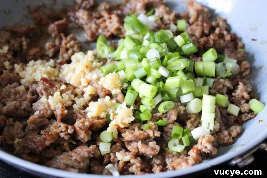 Italian-Style Stuffed Mushrooms with Garlic & Parmesan 6 sausage with garlic and chopped green onions