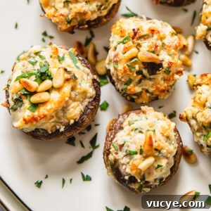 stuffed mushrooms on white plate