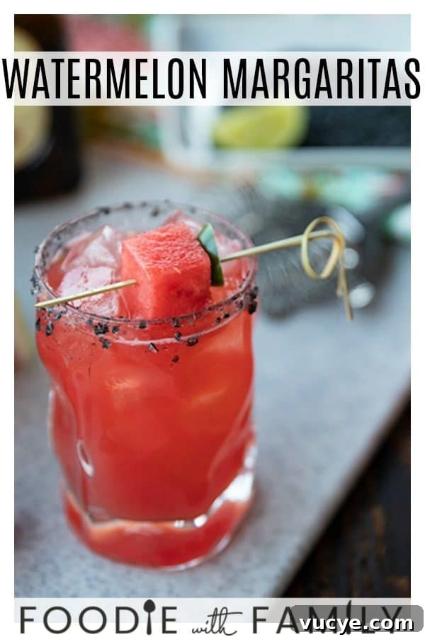 Pretty pink Watermelon Margaritas are refreshing, thirst quenching, lightly sweet cocktails for any time you need to cool down and chill out.