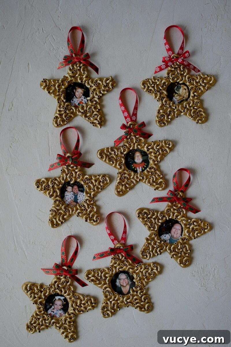 Handmade Pasta Christmas Ornaments: DIY Holiday Decorating Ideas 10 Pictures have been cut to size and glued to the back of the ornaments, and the easy pasta christmas ornaments are complete and ready to hang on the tree.
