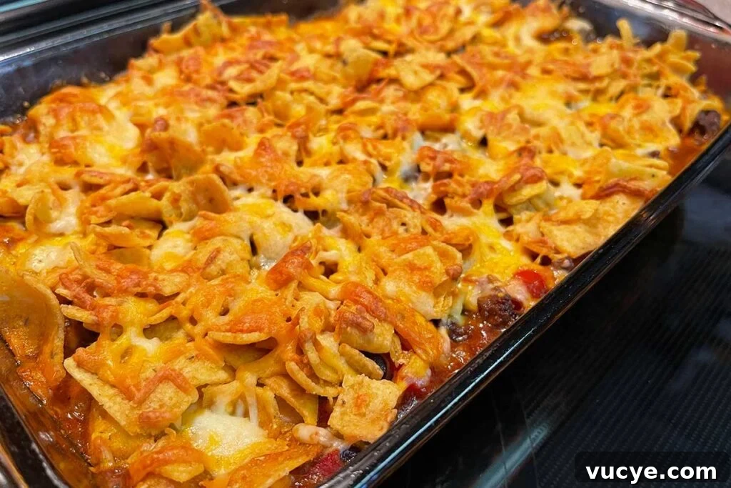 Cheesy Frito Pie Casserole with Chili and Corn Chips 7 Frito pie casserole right out of the oven